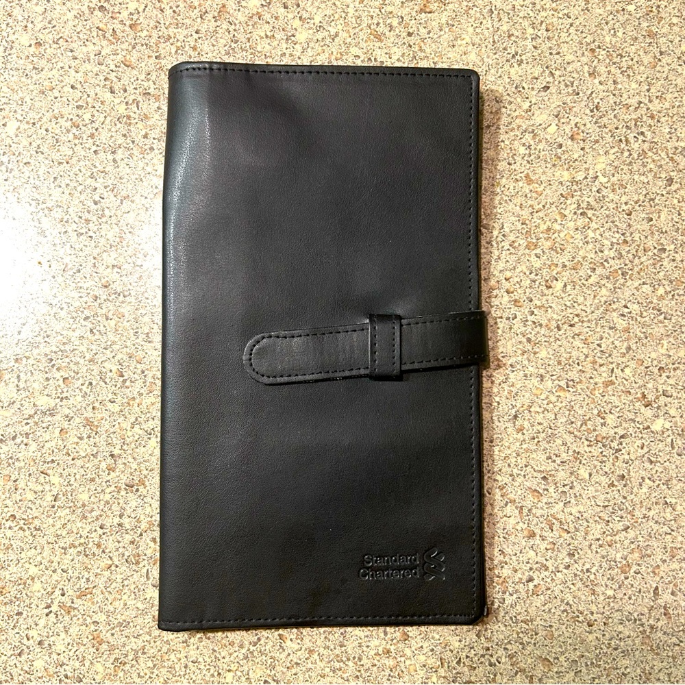 Black passport and card holder